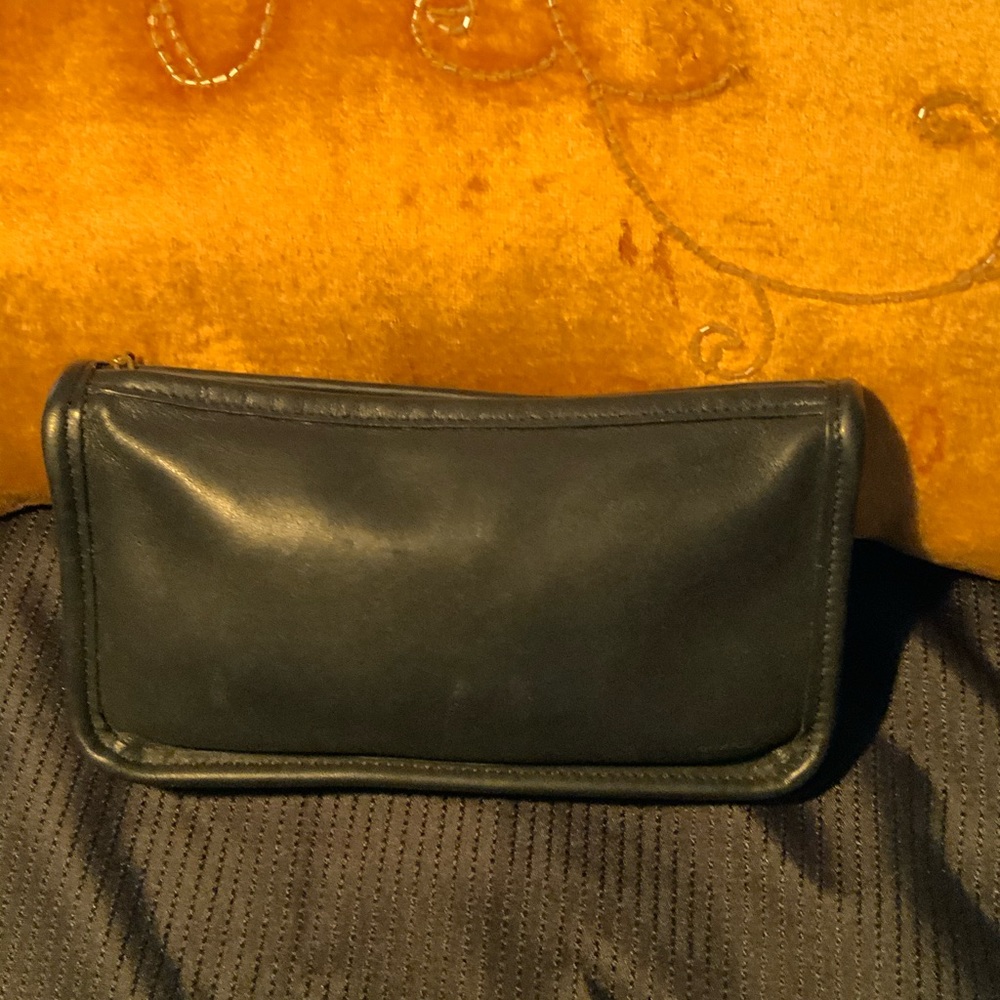 Coach vintage black leather chunky pouch cosmetic clutch bag
Pre-Loved